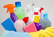 full box of cleaning supplies and gloves isolated on white