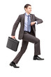 Full length portrait of a businessman climbing a virtual stairca