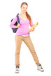 Full length portrait of a female student  holding backpac