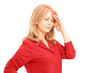 Mature woman having a headache