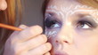 Video: close up of painting white mask close up of painting white mask