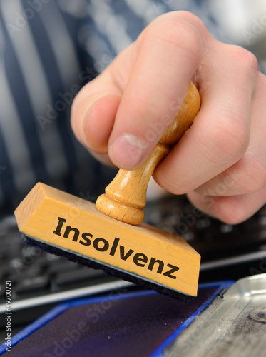 Photo: Stempel mit Schriftzug Insolvenz Stempel mit Schriftzug Insolvenz