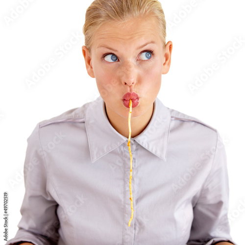 Photo: Slurping a string of pasta Slurping a string of pasta