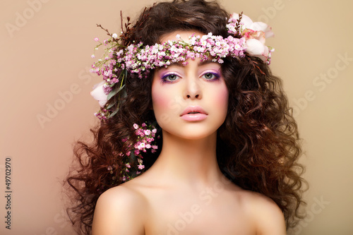Photo: Purity. Virginity. Attractive Charming Woman with Frizzy Hairs Purity. Virginity. Attractive Charming Woman with Frizzy Hairs