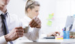 Photo: Young business man taking coffee break Young business man taking coffee break