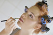 Photo: Adjusting the make up Adjusting the make up