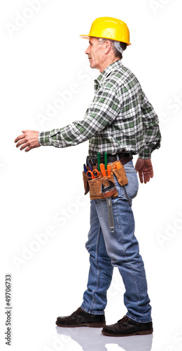 Photo: walking manual worker walking manual worker