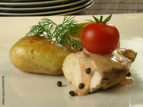 Photo: Baked potatoes and chicken breast Baked potatoes and chicken breast