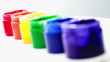 Rainbow paint pots in a row for gay pride