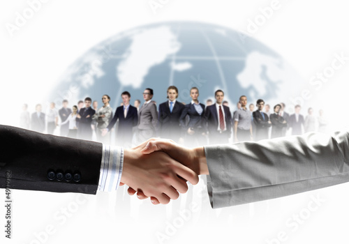Photo: image of business handshake image of business handshake