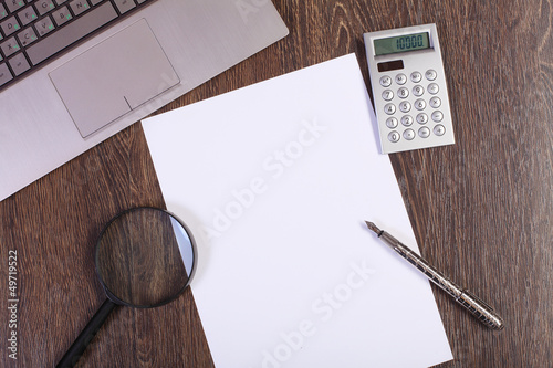 Photo: Businessman workplace with papers Businessman workplace with papers
