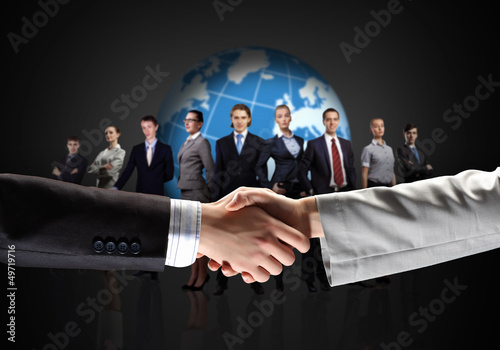 Photo: image of business handshake image of business handshake