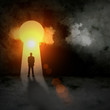 Silhouette of businessman in keyhole