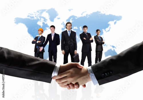 Photo: image of business handshake image of business handshake