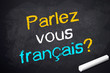 Kreidetafel mit parlez vous francais?