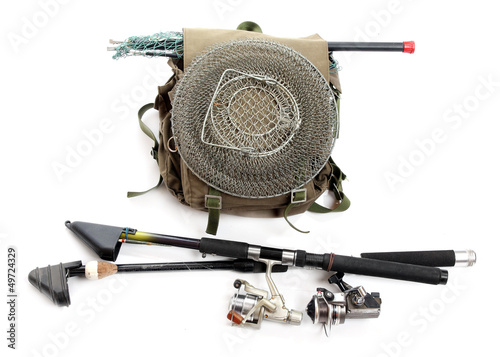 Photo: Accessories for angling - fishing rod and landing net. Accessories for angling - fishing rod and landing net.