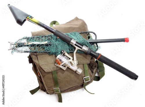 Photo: Accessories for angling - fishing rod and landing net. Accessories for angling - fishing rod and landing net.