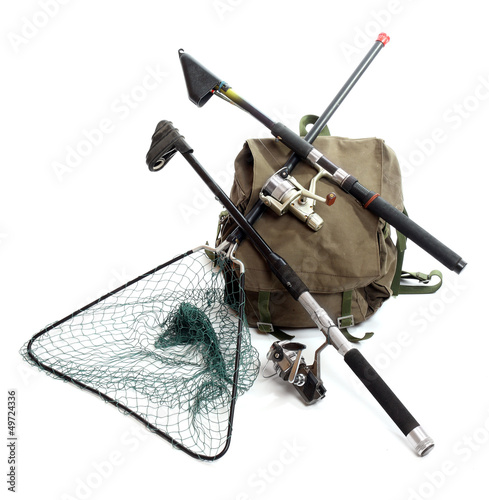 Photo: Accessories for angling - fishing rod and landing net. Accessories for angling - fishing rod and landing net.