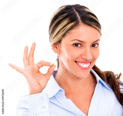 Photo: Business woman with an ok sign Business woman with an ok sign