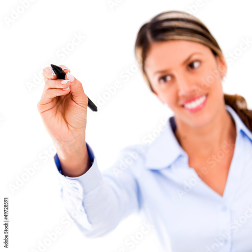 Photo: Businesswoman writing something Businesswoman writing something
