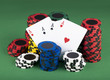 poker chips on a green table background