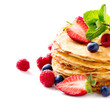 Pancake. Crepes With Berries. Pancakes stack isolated on a White