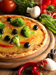 Pizza with ham, pepper and olives