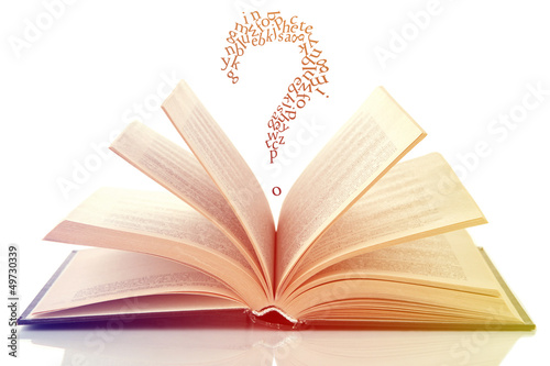 Photo: Opened book with letters flying out of it isolated on white Opened book with letters flying out of it isolated on white