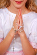 Foto: girl praying in day of the first holy communion girl praying in day of the first holy communion