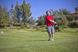 Photo: Young Businessman on the Golf Course Young Businessman on the Golf Course
