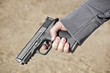 Holding a Hand Gun