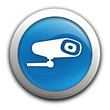 caméra sur bouton bleu