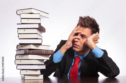 Photo: man at desk has much to learn man at desk has much to learn