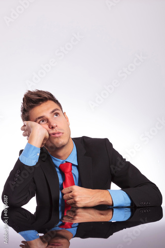 Photo: business man at desk dreaming business man at desk dreaming