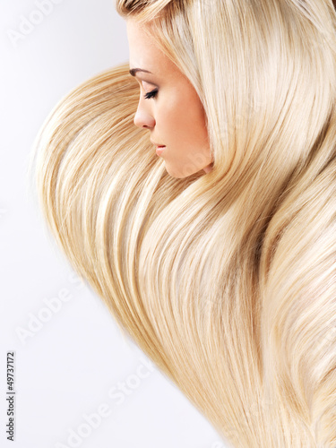 Photo: Blond woman with long straight hairs Blond woman with long straight hairs