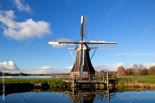 Photo: charming Dutch windmill charming Dutch windmill