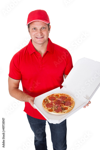 Photo: Portrait of pizza delivery guy Portrait of pizza delivery guy