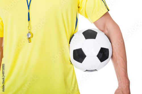 Photo: Soccer judge standing with ball Soccer judge standing with ball