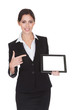 Smiling Businesswoman Holding Digital Tablet