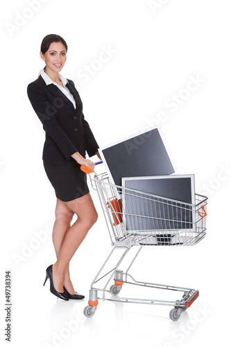Photo: Attractive Businesswoman Shopping Lcd Monitors Attractive Businesswoman Shopping Lcd Monitors