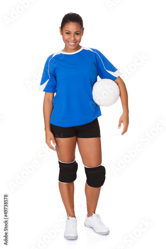 Photo: Young Girl Holding Volleyball Young Girl Holding Volleyball