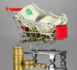 Money in cart on grey background