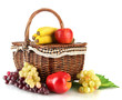 Picnic basket with fruits isolated on white