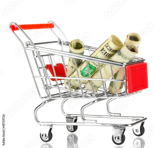 Photo: Money in cart isolated on white Money in cart isolated on white