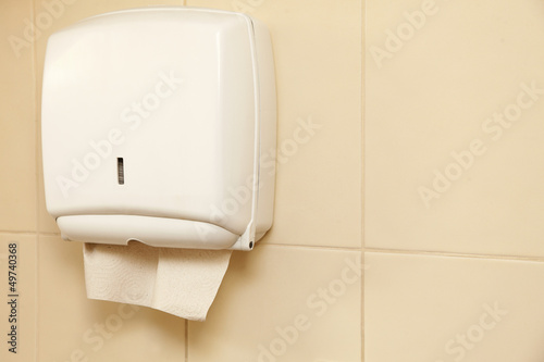 Photo: Paper towel dispenser in the bathroom Paper towel dispenser in the bathroom