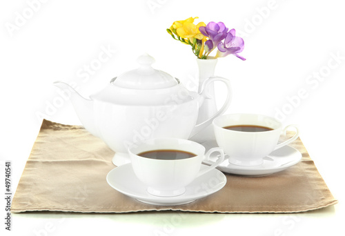 Photo: Beautiful tea service, isolated on white Beautiful tea service, isolated on white