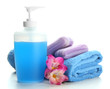 Bottle, soap and towel, isolated on white