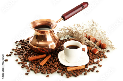 Photo: Coffee pot and coffee beans, isolated on white Coffee pot and coffee beans, isolated on white
