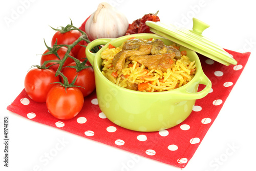 Photo: Delicious pilaf with vegetables isolated on white Delicious pilaf with vegetables isolated on white