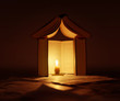 house of books with candle light inside